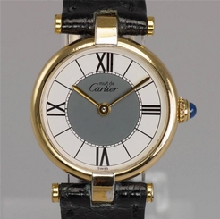 Must De Cartier Gold plated rare blue round Quartz 24mm Ladies Watch ca 1990's.