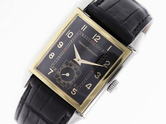 GIRARD PERREGAUX VINTAGE 18 AUTOMATIC BLACK DIAL TANK 18K GOLD BEZEL REF. 2594