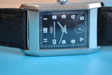 A the first IWC with Caliber 87 from 1934 in steel black Dial