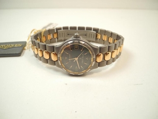NEW OLD STOCK TITAINUM/GOLD TONE LADIES LONGINES CONQUEST VHP WRISWATCH