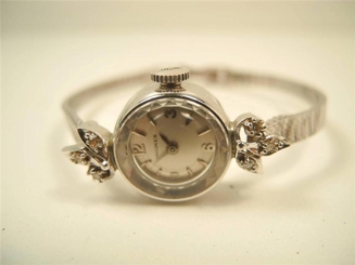 VINTAGE 1967 LADIES LONGINES 14KT WG AND DIAMONDS WRISTWATCH.