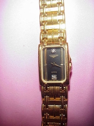 Gold colored Swiss Longines QWR Ladies Watch w/diamonds