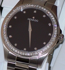 mint Mens Movado junior 0605962 0.90ct.aprx.Diamond bezel & Diamond dial watch.