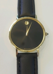 MOVADO 14K GOLD SWISS WATCH. BRAND NEW LEATHER BAND,UNISEX.