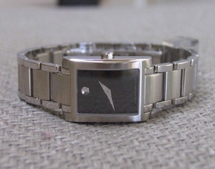 LADIES MOVADO 0606404 CERTE WRISTWATCH WITH BLACK MUSEUM DIAL (retail $995)