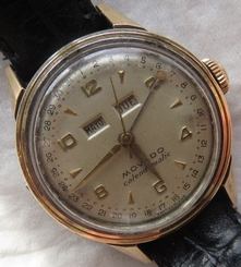 Movado Calendomatic Triple Date mens wristwatch steel & gold case 32,5 mm.