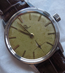 Omega mens wristwatch steel case screw cap load manual cal. 286