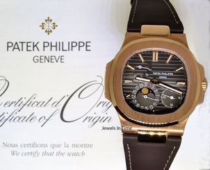 Patek Philippe Nautilus 18k Rose Gold Mens Watch Box/Papers 5712R-001