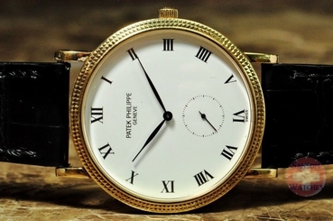 Patek Philippe Calatrava 3919J 18k Yellow Gold Hobnail bezel White Dial