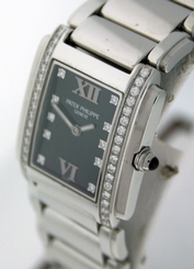 Patek Philippe Twenty-4 Diamond, Black Dial, Stainless Steel $13,00.00 watch.