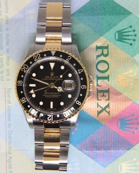 Rolex GMT-Master II 18k Yellow Gold Steel Black Dial/Bezel Mens Watch 16713