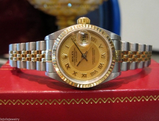 LADIES ROLEX DATEJUST MOTHER OF PEARL ROMAN NUMERAL TWO-TONE GOLD & STAINLESS 27543000069