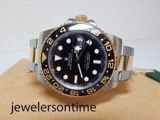 2009 Rolex 18K/SS GMT Master 2 Ceramic Bezel. "M" series Warranty Card 116713