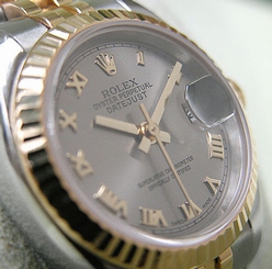 Rolex Ladies DATEJUST 179173 Steel & Yellow Gold Jubilee Silver Roman Dial 26MM