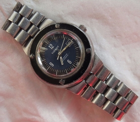 Tissot Navigator Automatic Date mens wristwatch 32,5 mm in diameter