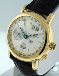 Ulysse Nardin GMT +/- Perpetual Calendar $37,200.00 RARE 18k Yellow Gold watch.