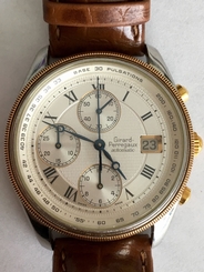 Girard-Perregaux. A stainless steel and gold automatic chronograph wristwatch
