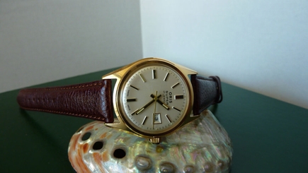 Oris Super hand winding gold plated mens watch.