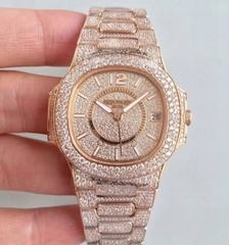 Patek Philippe Nautilus Jumbo Ladies Paved With Diamonds 7021/1R-001 N Rose Gold & Diamonds Diamond Dial M9015