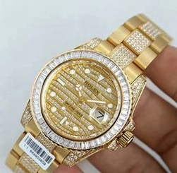 A Rolex Greenwich GMT II Series 116769TBR-74779B Watch Boutique Golden